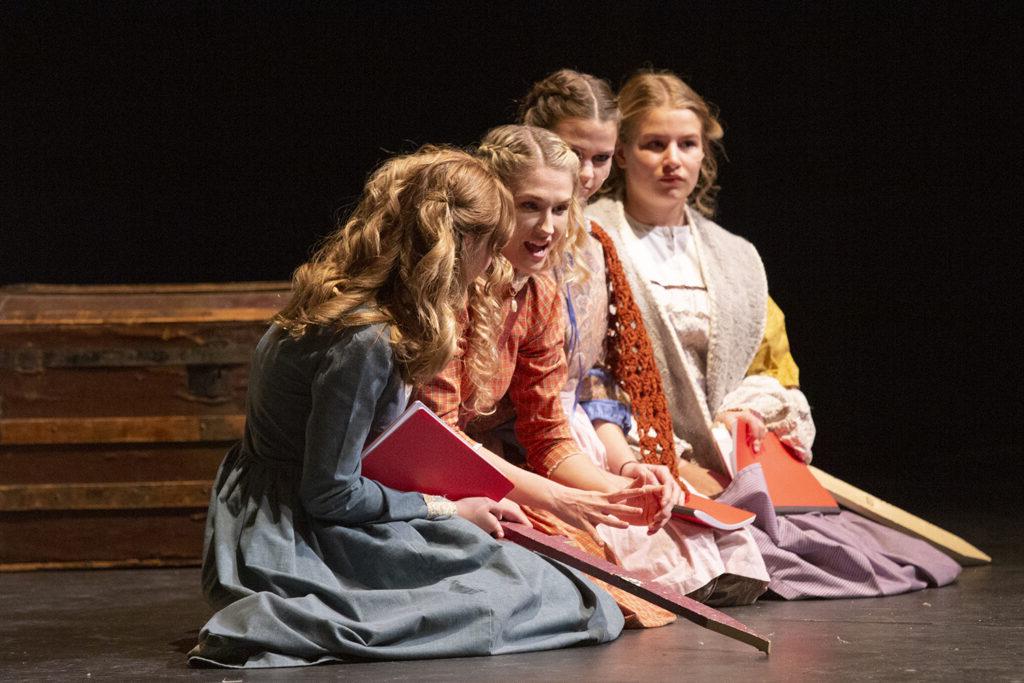 The cast of Little Women performs the parts of Jo, Meg, Amy, and Beth.